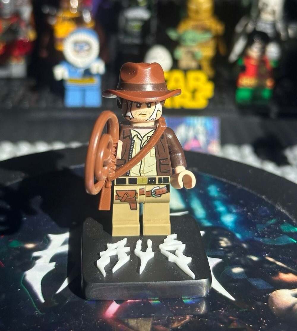 LEGO Indiana Jones Minifigure with Brown Jacket and Spider Web on Face (iaj056)